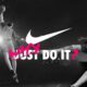 Nike's new 'Why Do It?' slogan on a minimalist ad, replacing the iconic 'Just Do It' for Gen Z.