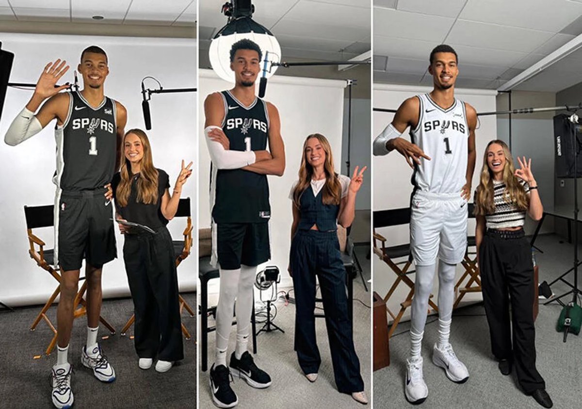 Victor Wembanyama in a Spurs uniform, showcasing his exceptional height and wingspan on the basketball court.