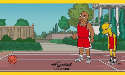 LeBron James and Bugs Bunny in a scene from the animated film Space Jam, celebrating basketball cameos.