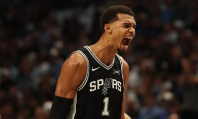 Victor Wembanyama of the Spurs dunks the ball against the Dallas Mavericks in his historic NBA return.