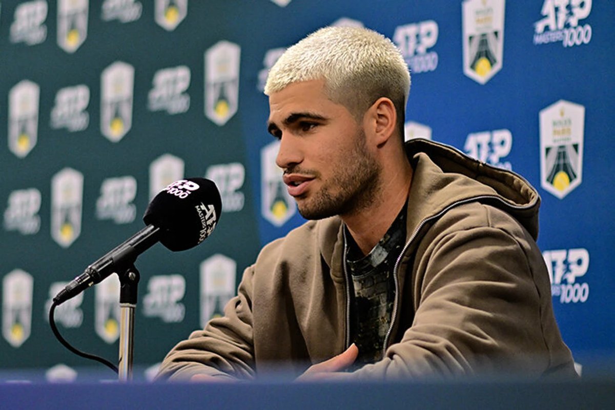 Carlos Alcaraz celebrating his Clásico victory after his 1% probability prediction came true.