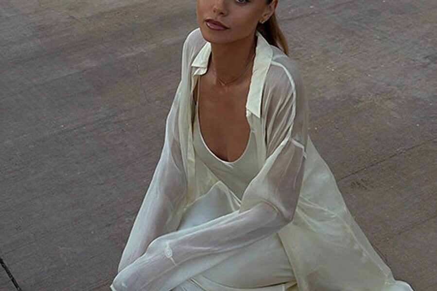 Jannik Sinner and his girlfriend, model Laila Hasanovic, posing together at a public event.