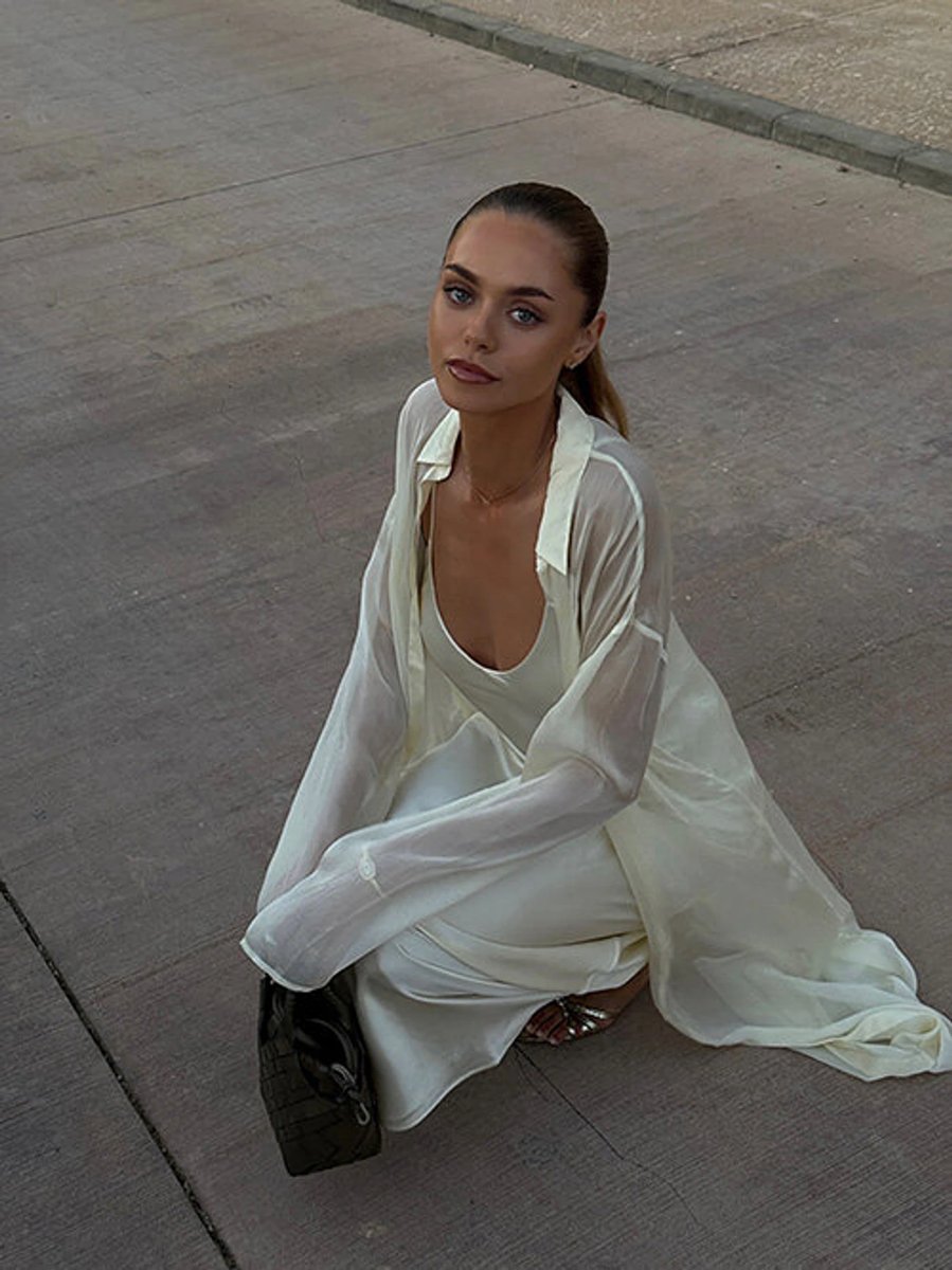 Jannik Sinner and his girlfriend, model Laila Hasanovic, posing together at a public event.
