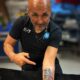 Luciano Spalletti showing his SSC Napoli tattoo while discussing his time coaching the Italian football club.