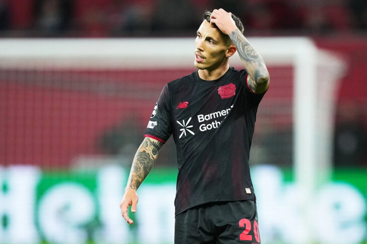 Xabi Alonso on the touchline managing Bayer Leverkusen during a Bundesliga match.