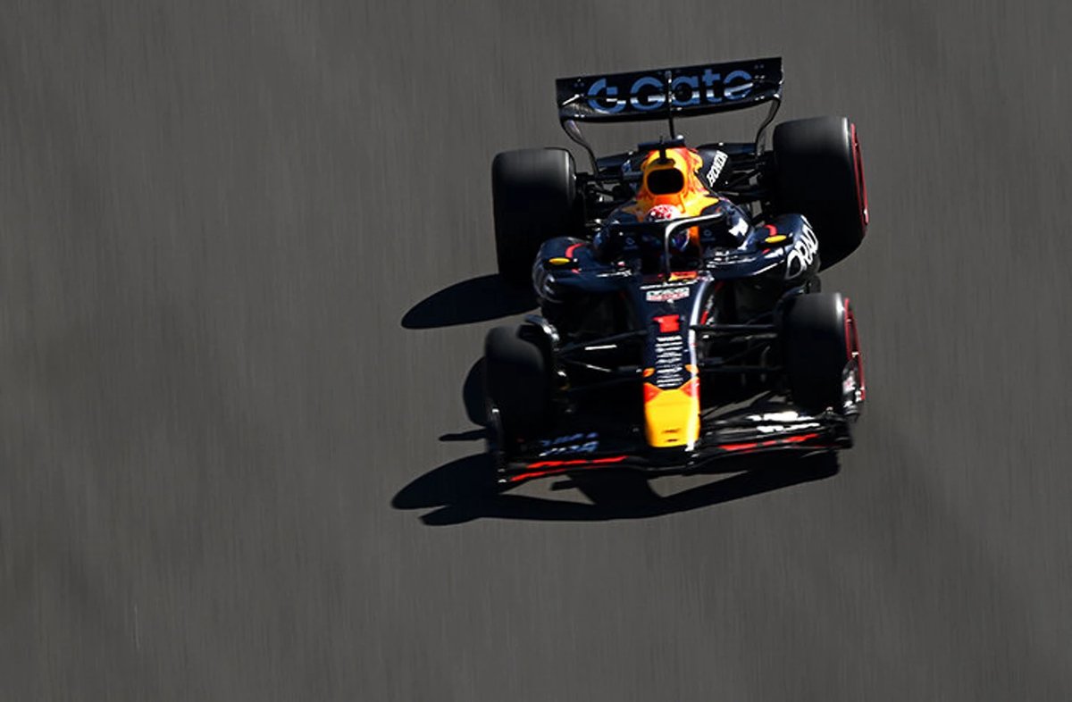 Max Verstappen's Red Bull F1 car leads Lando Norris' McLaren at the Mexico Grand Prix.
