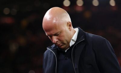 Liverpool manager Arne Slot looks concerned on the touchline during a poor performance.