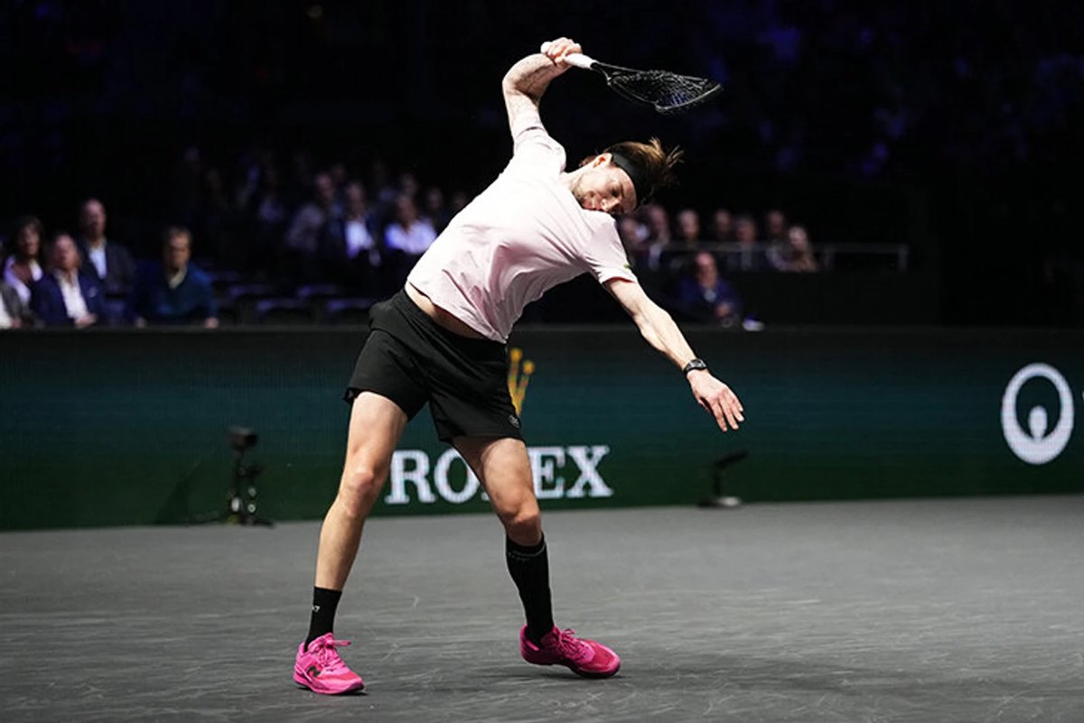 Alexander Bublik smashes his tennis racket on the court during his Paris Masters match against Felix Auger-Aliassime.