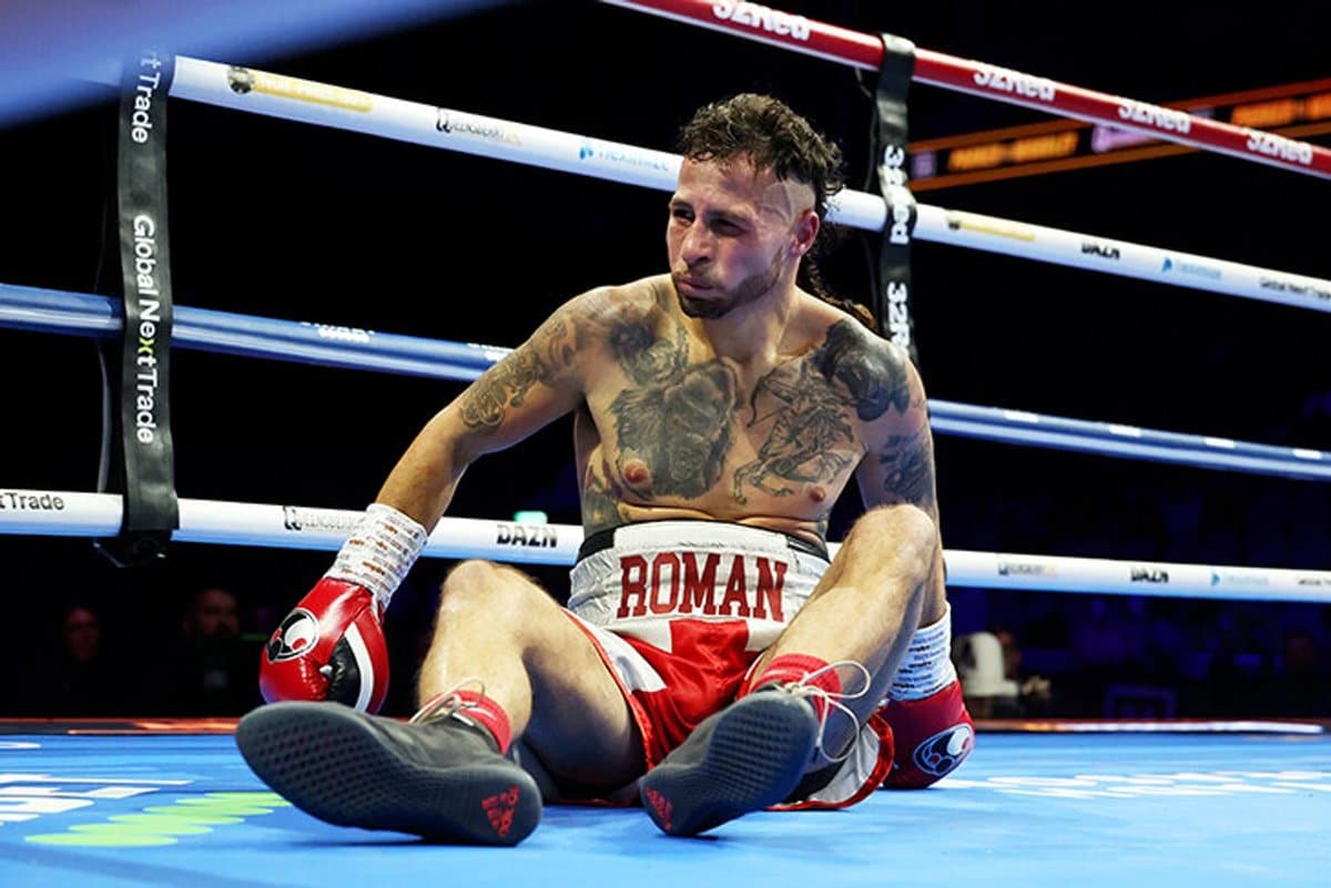 Jake Pollard, the boxer with a 1-100 record, looking determined in the boxing ring.