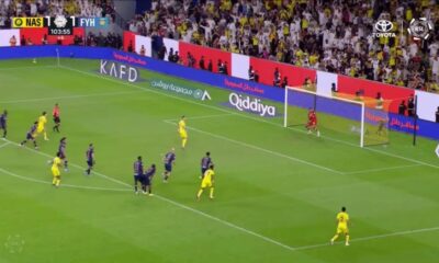 Cristiano Ronaldo celebrating a goal with his signature 'Siu' and Arabic dance moves on the pitch.