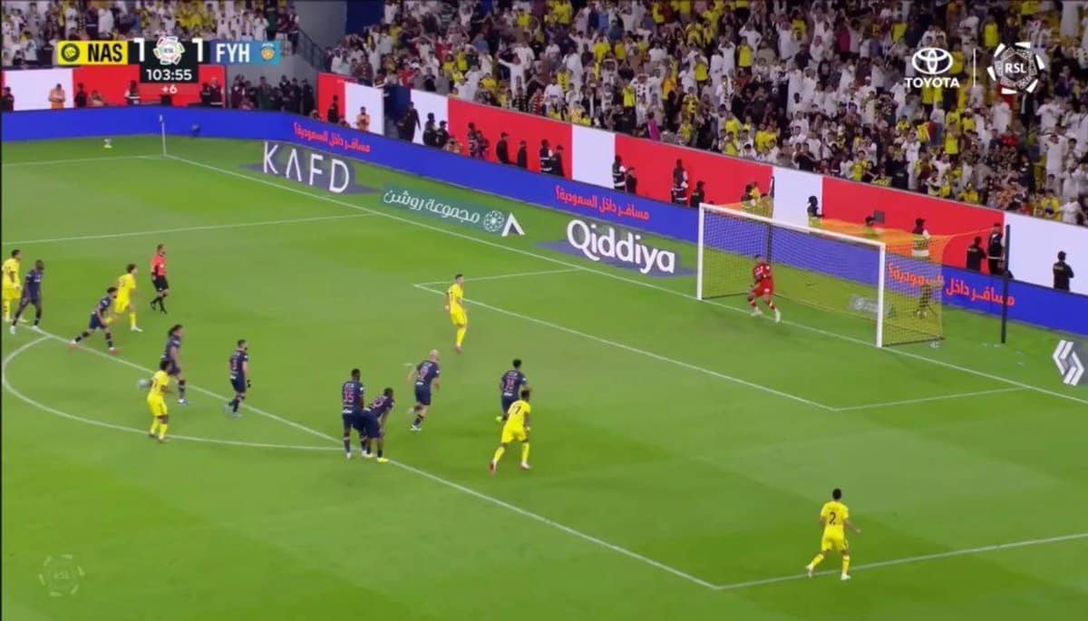 Cristiano Ronaldo celebrating a goal with his signature 'Siu' and Arabic dance moves on the pitch.