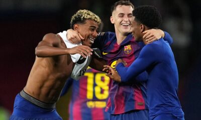 Barcelona players celebrating a goal against Elche after their El Clásico victory.