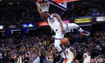 NBA players celebrating a game-winning shot as basketball returns to the court after a hiatus.