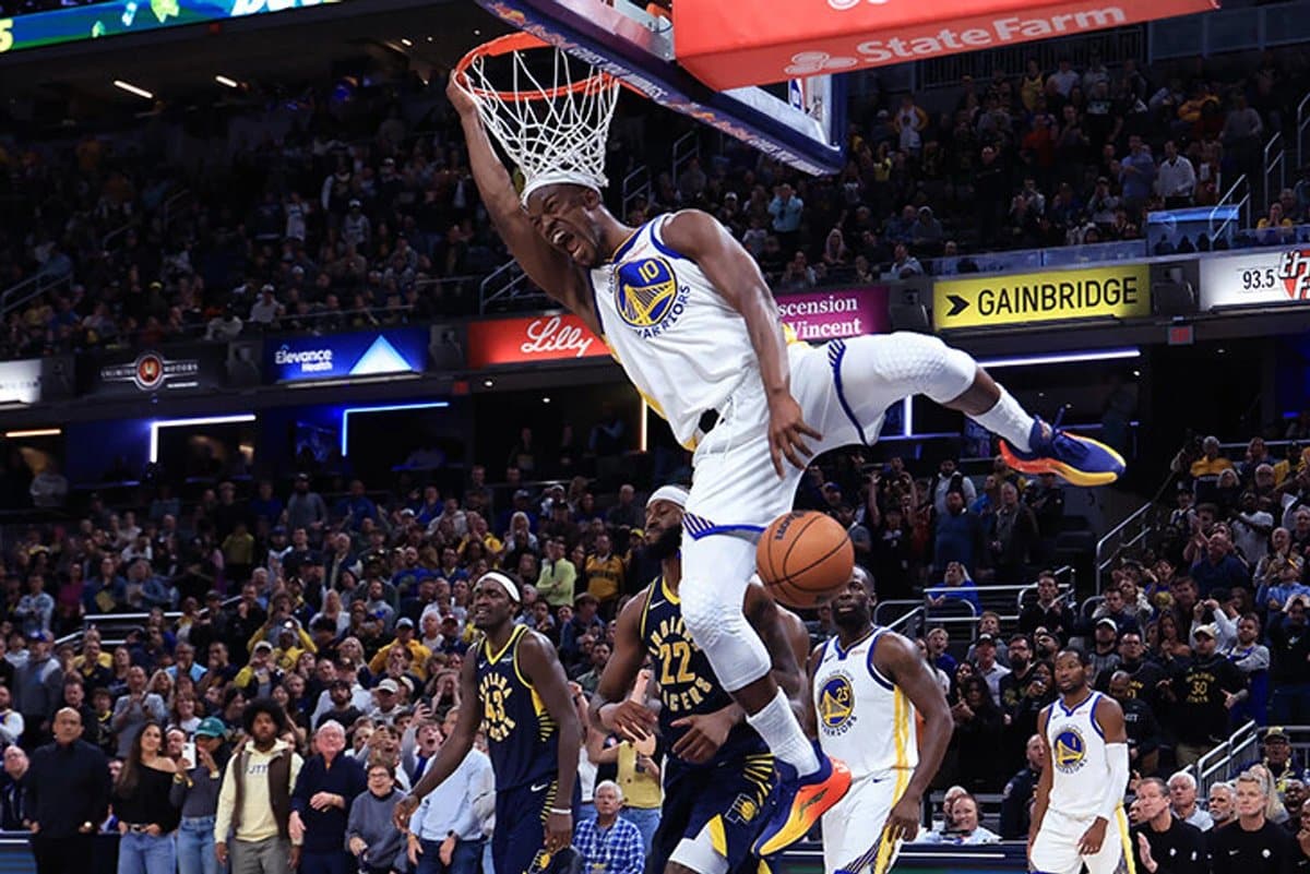 NBA players celebrating a game-winning shot as basketball returns to the court after a hiatus.