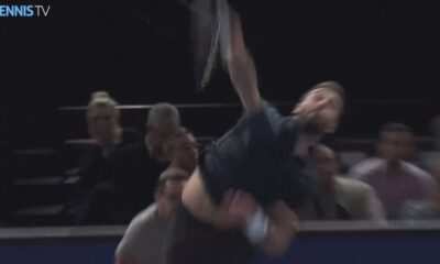 Benoit Paire hitting his famous tweener shot during a tennis match, celebrating 10 years since the iconic moment.