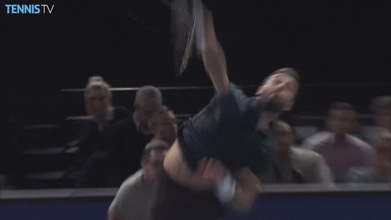 Benoit Paire hitting his famous tweener shot during a tennis match, celebrating 10 years since the iconic moment.