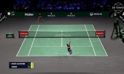 Jannik Sinner holding the Paris Masters trophy after winning to reclaim the ATP world No.1 ranking.